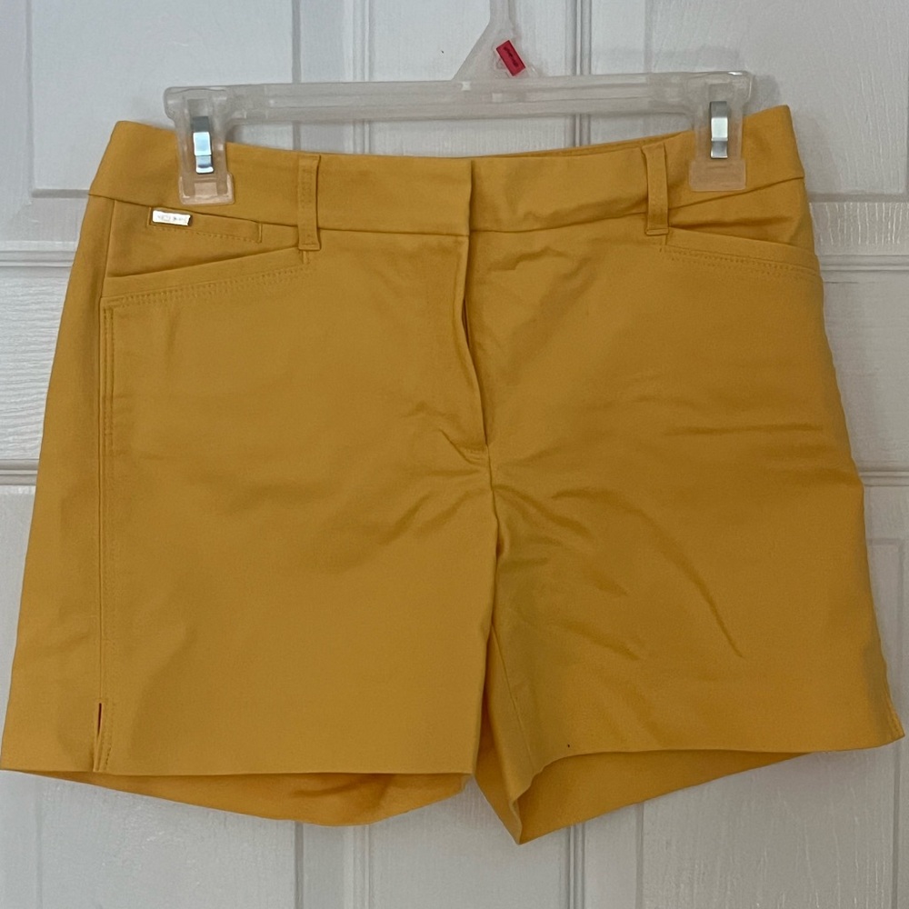 White House Black Market dress casual shorts.  5”, hits mid /upper thigh